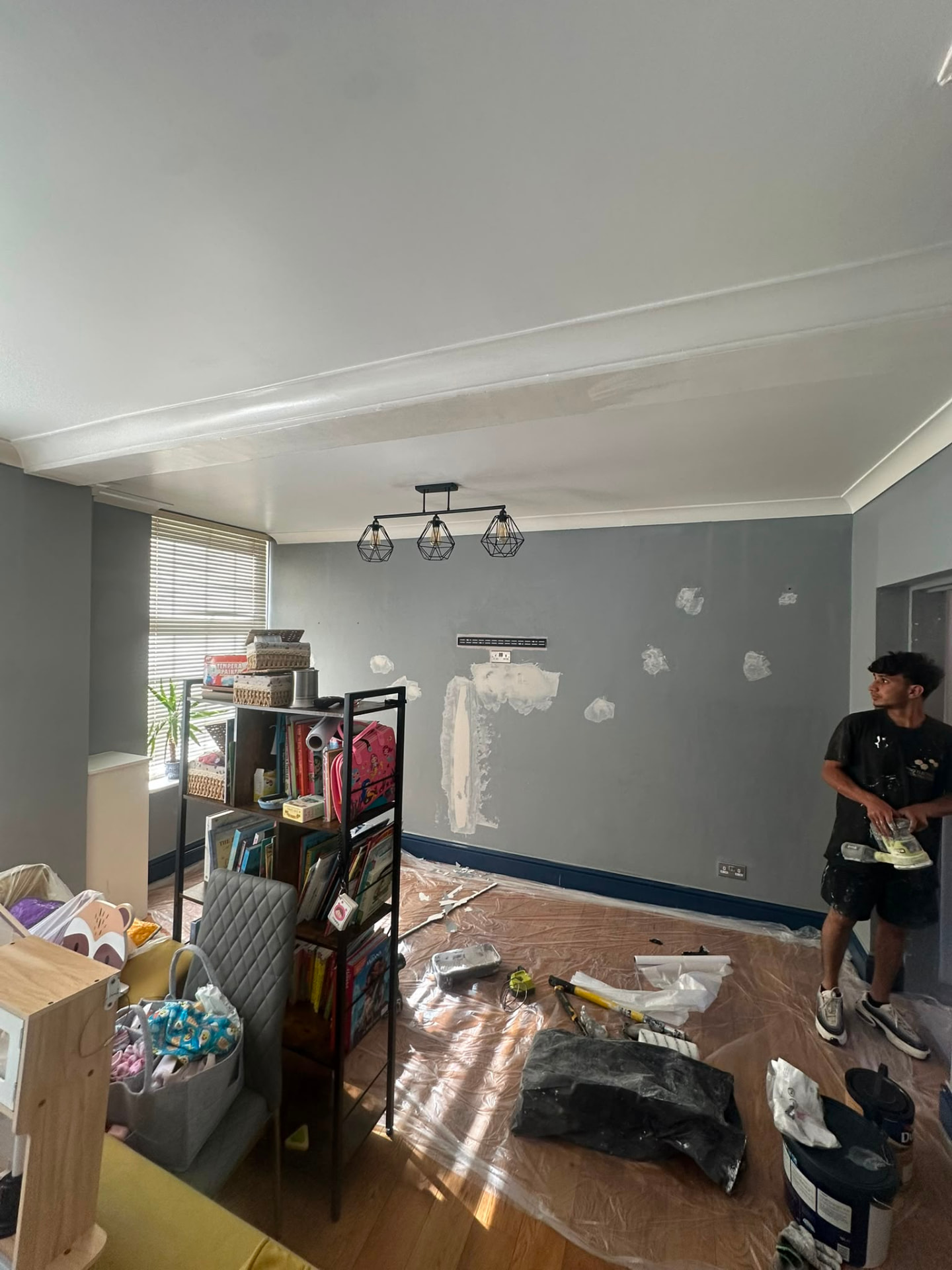 Lounge walls prepared before decorating in Croydon